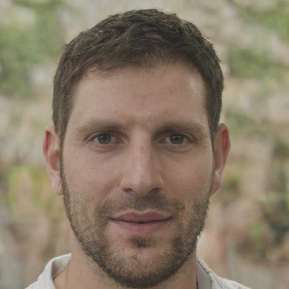 Instructor Callum Thorne reviewing student budget plans