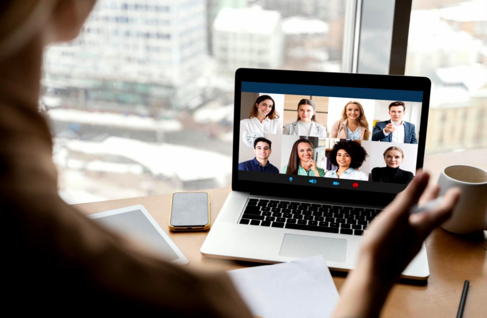 Collaborative business environment showing team members engaged in financial planning discussion